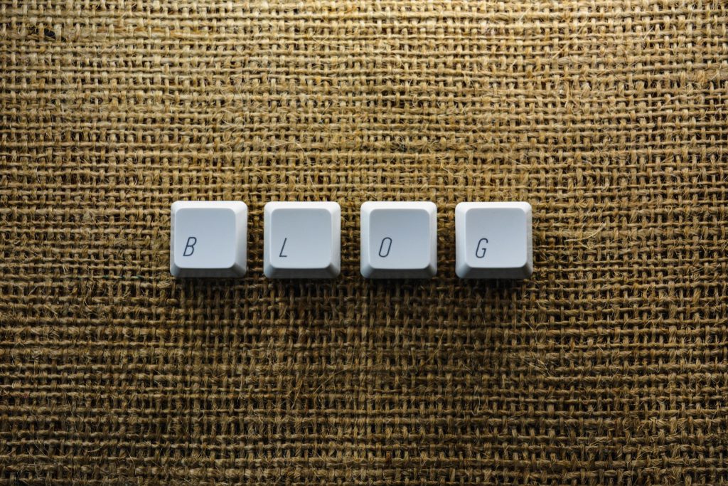 Gallery Close-up of keyboard keys spelling 'BLOG' on a burlap surface, ideal for tech blogs.